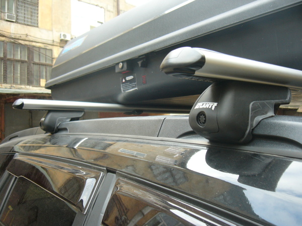 Как установить багажник на крышу автомобиля?