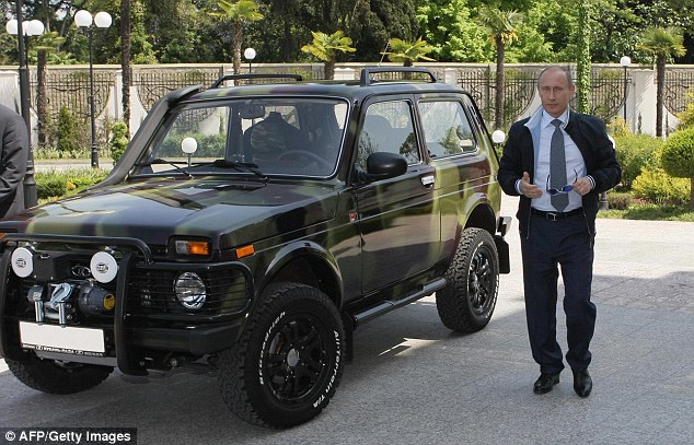 Putin power: The Russian president gave Lada a plug back in 2009 - only to reveal he